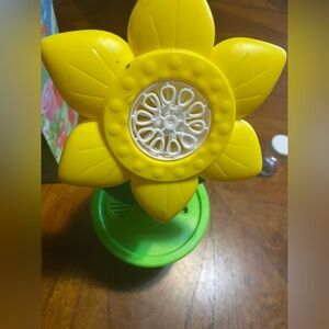 Yellow and Green Flower-Shaped Musical Bubble Machine